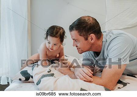 Father and daughter after bath time View Large Photo Image Stock Photography - Father and daughter after bath time. Fotosearch
