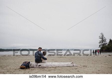 Picture - Father and daughter on beach, Tofino, Canada. Fotosearch