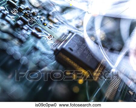 Fibre optics carrying data passing through electronic circuit boards, close up View Large Photo Image Stock Image - Fibre optics carrying data passing through electronic circuit boards, close up. Fotosearch