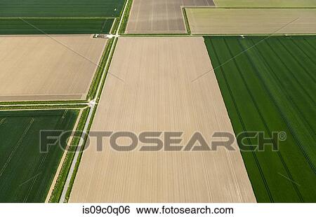 Fields with roads and ditches between them in spring, aerial view, Netherlands View Large Photo Image Stock Photograph - Fields with roads and ditches between them in spring, aerial view, Netherlands. Fotosearch