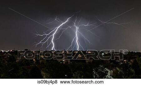 Forking lightning over Aurora, Colorado, US View Large Photo Image Stock Photo - Forking lightning over Aurora, Colorado, US. Fotosearch