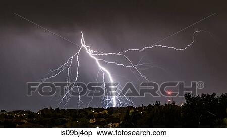 Forking lightning over Aurora, Colorado, US View Large Photo Image Stock Photography - Forking lightning over Aurora, Colorado, US. Fotosearch