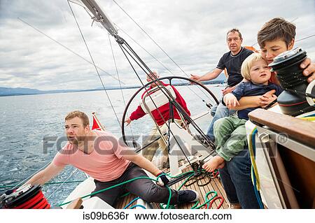 Four generation family on sailing boat, Geneva, Switzerland, Europe View Large Photo Image Stock Photography - Four generation family on sailing boat, Geneva, Switzerland, Europe. Fotosearch