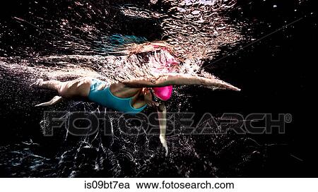Stock Image - Freestyle swimming. Fotosearch
