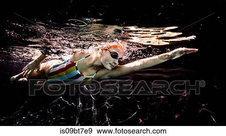 Stock Photo - Freestyle swimming. Fotosearch