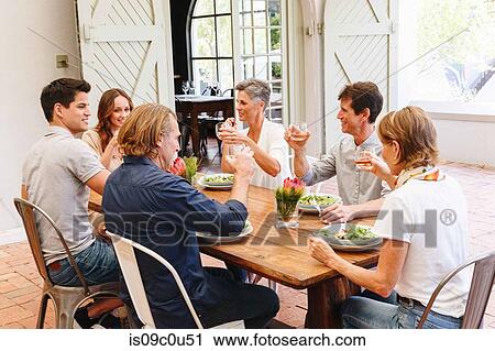 Friends and family having lunch in restaurant, Cape Town, South Africa View Large Photo Image Stock Image - Friends and family having lunch in restaurant, Cape Town, South Africa. Fotosearch