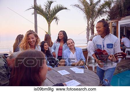 Friends at party by beach, Plettenberg Bay, Western Cape, South Africa View Large Photo Image Stock Image - Friends at party by beach, Plettenberg Bay, Western Cape, South Africa. Fotosearch