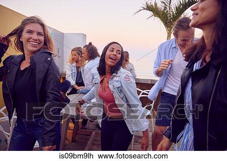 Friends at party by beach, Plettenberg Bay, Western Cape, South Africa View Large Photo Image Stock Image - Friends at party by beach, Plettenberg Bay, Western Cape, South Africa. Fotosearch