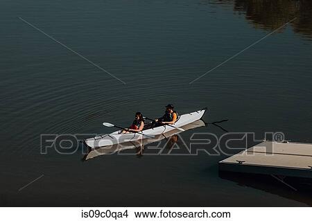 Picture - Friends kayaking in lake, Kaweah, California, United States. Fotosearch