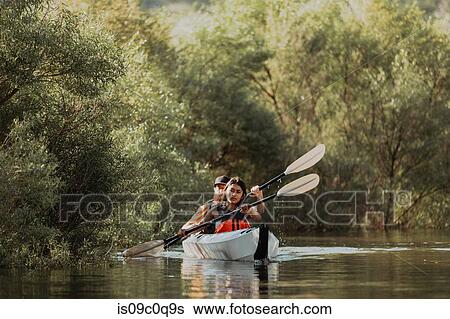 Friends kayaking in lake, Kaweah, California, United States View Large Photo Image Stock Photograph - Friends kayaking in lake, Kaweah, California, United States. Fotosearch