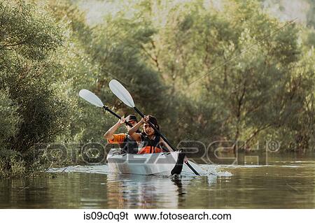 Friends kayaking in lake, Kaweah, California, United States View Large Photo Image Stock Photograph - Friends kayaking in lake, Kaweah, California, United States. Fotosearch