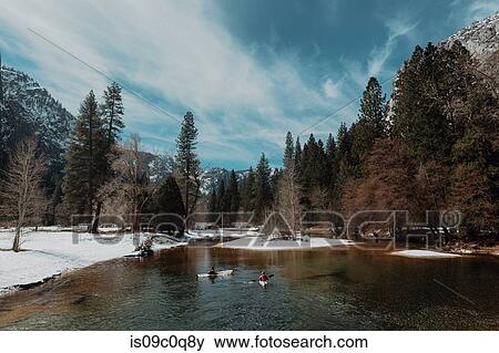 Friends kayaking in lake, Yosemite Village, California, United States View Large Photo Image Stock Photo - Friends kayaking in lake, Yosemite Village, California, United States. Fotosearch