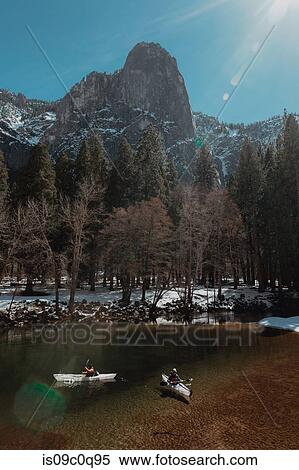 Friends kayaking in lake, Yosemite Village, California, United States View Large Photo Image Stock Photography - Friends kayaking in lake, Yosemite Village, California, United States. Fotosearch