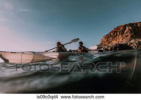 Friends kayaking in sea, Big Sur, California, United States View Large Photo Image Picture - Friends kayaking in sea, Big Sur, California, United States. Fotosearch