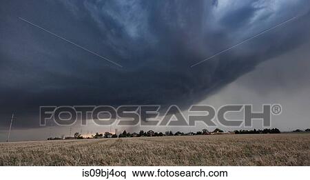 Funnel cloud with mesocyclone above over rural Kansas, US View Large Photo Image Stock Photography - Funnel cloud with mesocyclone above over rural Kansas, US. Fotosearch