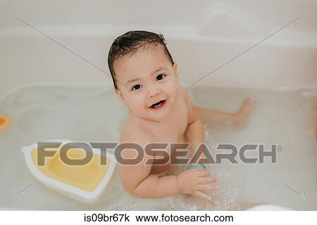 Girl in bathtub View Large Photo Image Stock Image - Girl in bathtub. Fotosearch