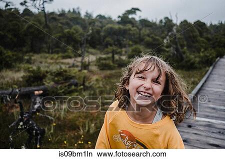 Girl in forest, Tofino, Canada View Large Photo Image Picture - Girl in forest, Tofino, Canada. Fotosearch