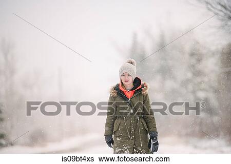 Girl in winter landscape View Large Photo Image Stock Photograph - Girl in winter landscape. Fotosearch