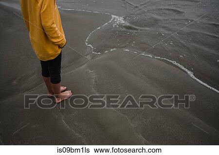 Girl on beach, Tofino, Canada View Large Photo Image Stock Photograph - Girl on beach, Tofino, Canada. Fotosearch