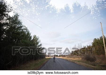 Girl rollerblading on country road, Bath, Canada View Large Photo Image Picture - Girl rollerblading on country road, Bath, Canada. Fotosearch