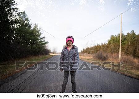 Girl rollerblading on country road, Bath, Canada View Large Photo Image Picture - Girl rollerblading on country road, Bath, Canada. Fotosearch