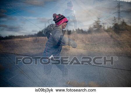 Girl rollerblading on country road View Large Photo Image Stock Image - Girl rollerblading on country road. Fotosearch