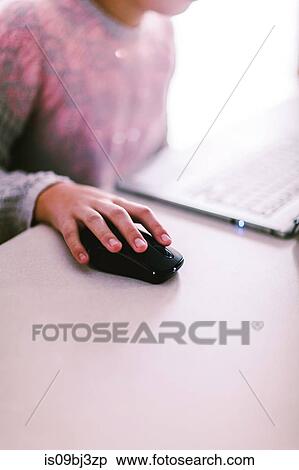 Girl using laptop at home View Large Photo Image Stock Photography - Girl using laptop at home. Fotosearch