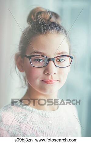 Picture - Girl wearing eyeglasses. Fotosearch