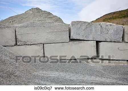 Stock Photo - Gravel and concrete blocks stacked on construction site, Big Sur, California, USA. Fotosearch