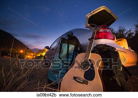Guitar, backpack and luggage by car boot View Large Photo Image Stock Image - Guitar, backpack and luggage by car boot. Fotosearch