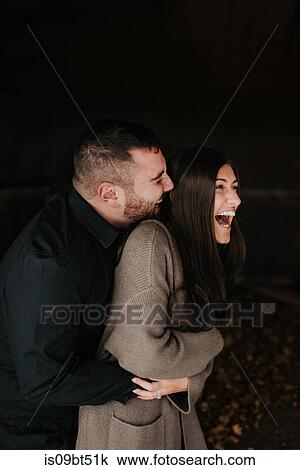 Happy couple enjoying romance and hugs View Large Photo Image Stock Image - Happy couple enjoying romance and hugs. Fotosearch