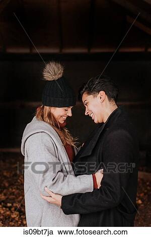 Happy couple enjoying romance and hugs View Large Photo Image Stock Image - Happy couple enjoying romance and hugs. Fotosearch
