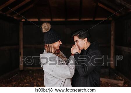 Happy couple enjoying romance and hugs View Large Photo Image Stock Photo - Happy couple enjoying romance and hugs. Fotosearch