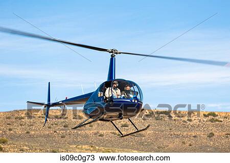 Helicopter flying above rural landscape, Cape Town, Western Cape, South Africa View Large Photo Image Stock Image - Helicopter flying above rural landscape, Cape Town, Western Cape, South Africa. Fotosearch