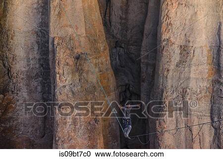Highlining in Piedra Parada, south Patagonia, Argentina View Large Photo Image Stock Image - Highlining in Piedra Parada, south Patagonia, Argentina. Fotosearch