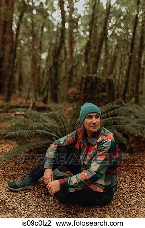 Stock Image - Hiker enjoying forest, Queenstown, Canterbury, New Zealand. Fotosearch
