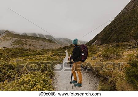 Hiker exploring trail, Wanaka, Taranaki, New Zealand View Large Photo Image Stock Photo - Hiker exploring trail, Wanaka, Taranaki, New Zealand. Fotosearch