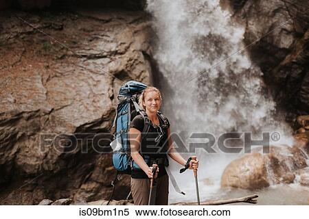 Hiker in front of waterfall, Annapurna Circuit, the Himalayas, Manang, Nepal View Large Photo Image Stock Photography - Hiker in front of waterfall, Annapurna Circuit, the Himalayas, Manang, Nepal. Fotosearch
