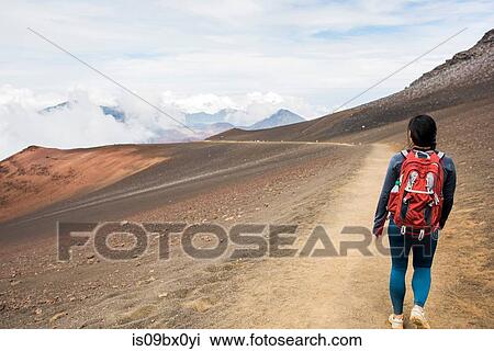 Hiker on hiking trail, Haleakala National Park, Maui, Hawaii View Large Photo Image Stock Image - Hiker on hiking trail, Haleakala National Park, Maui, Hawaii. Fotosearch
