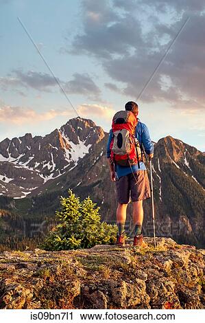 Hiker on mountain peak, Mount Sneffels, Ouray, Colorado, USA View Large Photo Image Stock Image - Hiker on mountain peak, Mount Sneffels, Ouray, Colorado, USA. Fotosearch