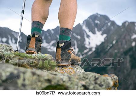 Stock Photo - Hiker on mountain peak, Mount Sneffels, Ouray, Colorado, USA. Fotosearch