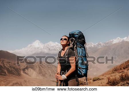 Hiker on peak, Annapurna Circuit, the Himalayas, Dhaulagiri and Tukuche mountains in background, Muktinath, Nepal View Large Photo Image Stock Photo - Hiker on peak, Annapurna Circuit, the Himalayas, Dhaulagiri and Tukuche mountains in background, Muktinath, Nepal. Fotosearch