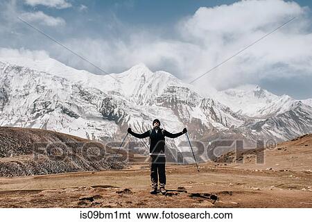 Hiker on trail, Annapurna Circuit, the Himalayas, Manang, Nepal View Large Photo Image Stock Photograph - Hiker on trail, Annapurna Circuit, the Himalayas, Manang, Nepal. Fotosearch