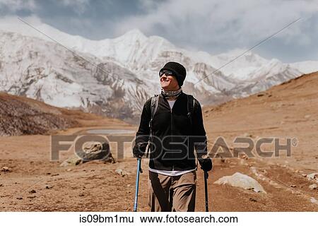 Hiker on trail, Annapurna Circuit, the Himalayas, Manang, Nepal View Large Photo Image Stock Photograph - Hiker on trail, Annapurna Circuit, the Himalayas, Manang, Nepal. Fotosearch