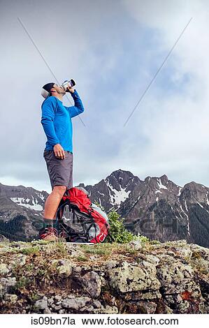 Hiker taking break, Mount Sneffels, Ouray, Colorado, USA View Large Photo Image Stock Image - Hiker taking break, Mount Sneffels, Ouray, Colorado, USA. Fotosearch