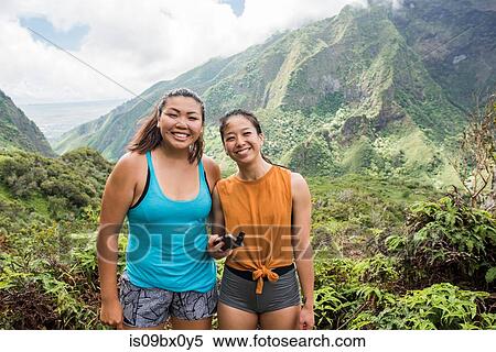 Hikers posing for photograph in rainforest, Iao Valley, Maui, Hawaii View Large Photo Image Stock Photography - Hikers posing for photograph in rainforest, Iao Valley, Maui, Hawaii. Fotosearch
