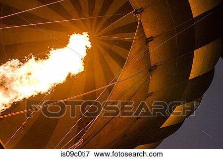 Hot air balloon being prepared for flight View Large Photo Image Stock Photo - Hot air balloon being prepared for flight. Fotosearch