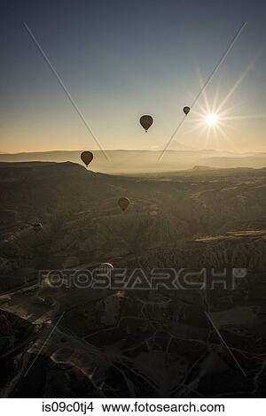 Hot air balloon over Greme, Cappadocia, Turkey View Large Photo Image Picture - Hot air balloon over Greme, Cappadocia, Turkey. Fotosearch