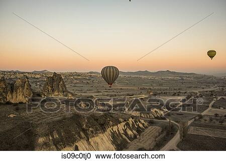 Hot air balloon over Greme, Cappadocia, Turkey View Large Photo Image Stock Image - Hot air balloon over Greme, Cappadocia, Turkey. Fotosearch