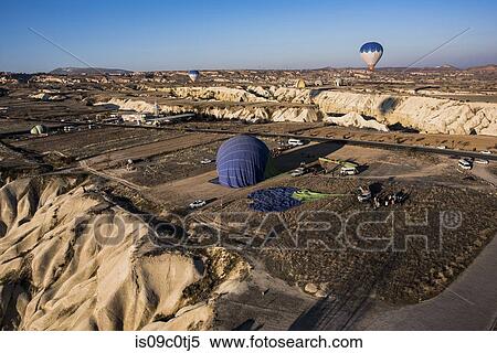 Hot air balloon over Greme, Cappadocia, Turkey View Large Photo Image Stock Photography - Hot air balloon over Greme, Cappadocia, Turkey. Fotosearch